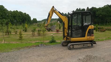 Camkat Excavations Mini Digger & Driver for hire